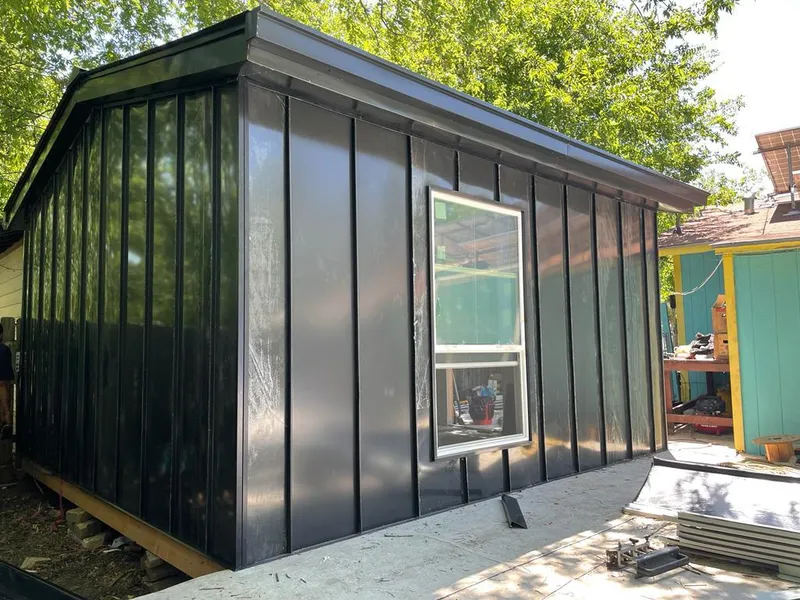 Black standing seam metal wall panels for Roof Inspection in Lake Barrington